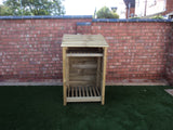 Small featheredge log store with shelf