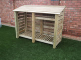 Large slatted log store with shelf