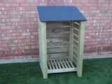 Small slatted log store with felt roof