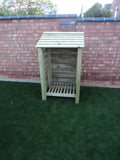 Small slatted log store