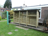 Very large slatted log store with felt roof and shelf