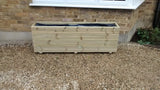 4 rows of decking trough planters