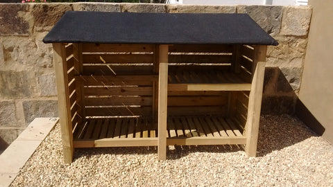 Large slatted log store with felt roof and shelf