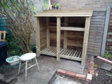 Large featheredge log store with shelf
